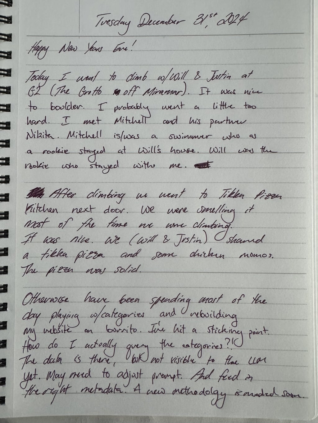 This is a photograph of a handwritten journal entry on a white, lined page. The writing is done in black ink, and the text is written in a cursive style. The journal entry is dated Tuesday, December 31st, 2021, and it appears to be a reflection on the author's activities and thoughts for the day. The author discusses going climbing with friends, meeting new people, spending time at Will's house, and enjoying a meal at Tikka Pizza Kitchen. The author also mentions spending time playing categories and rebuilding their website. The text includes personal anecdotes and reflections on the day's events.